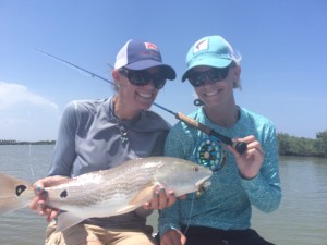 Lindsay and Mayon, in town for ICAST, enjoying a day off fishing for Mosquito Lagoon Redfish.